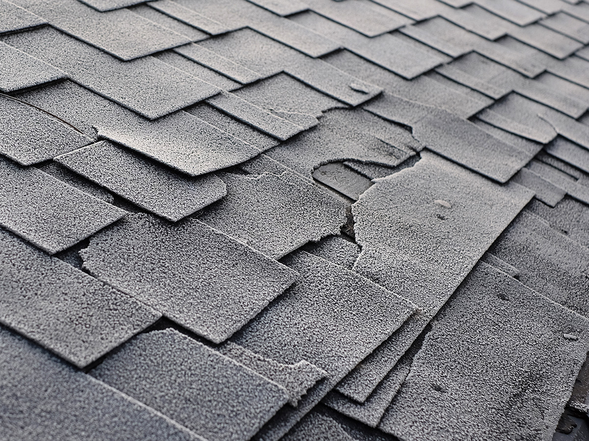 Image of a roof with missing shingles