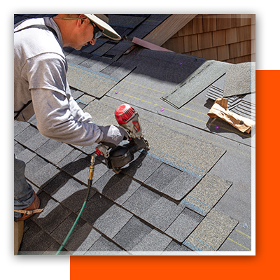 roofer using power tools