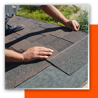 worker installing new roofing